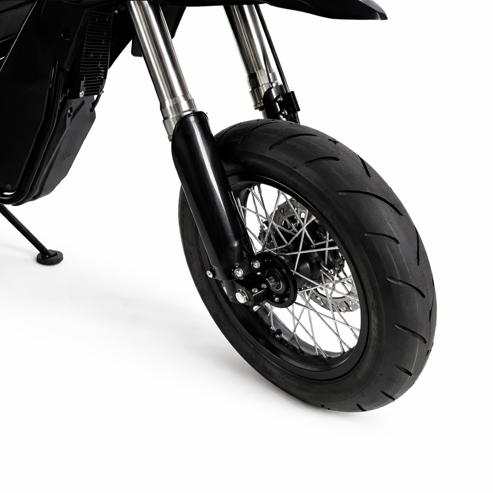 Close-up of a motorcycle wheel on a white background