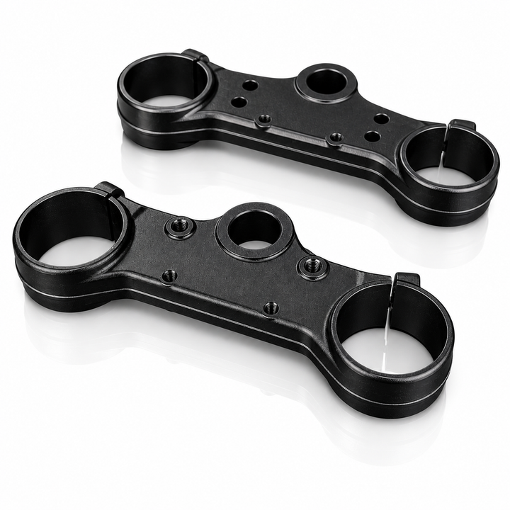 Two black metal brackets on a white background
