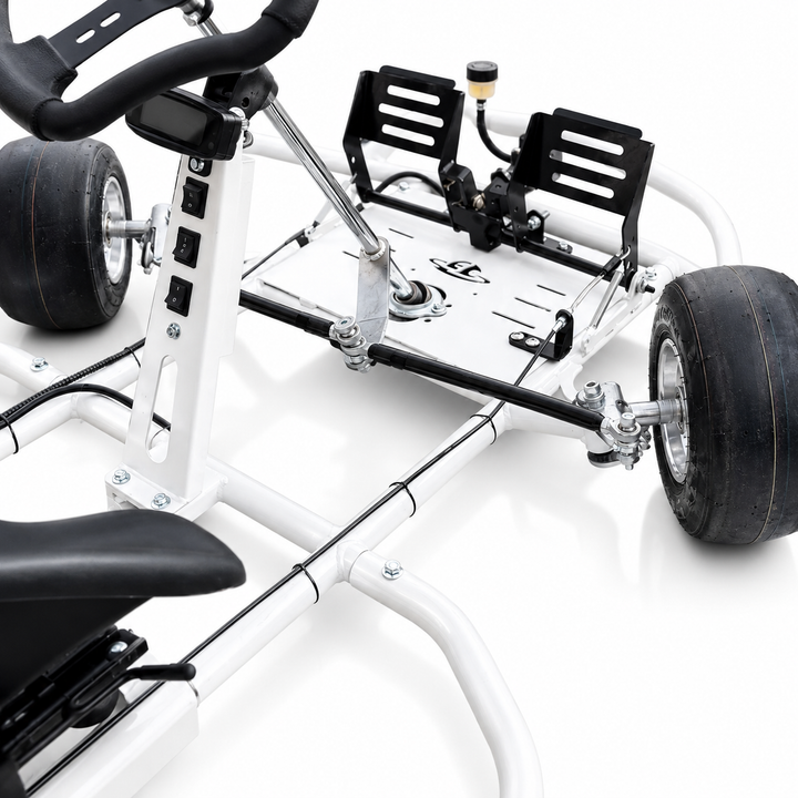 Close-up of a go-kart chassis with visible components on a white background