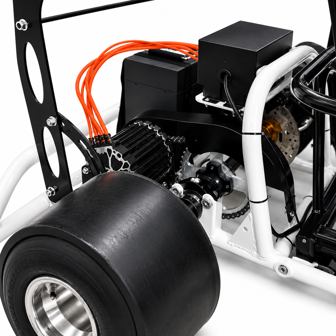 Close-up of a mechanical system with black wheel, white frame, and orange cables on a white background
