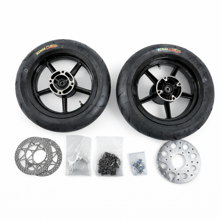 Two scooter wheels with additional parts on a white background