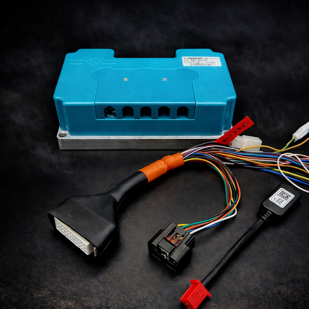 Blue electronic module with wiring harnesses on a dark background
