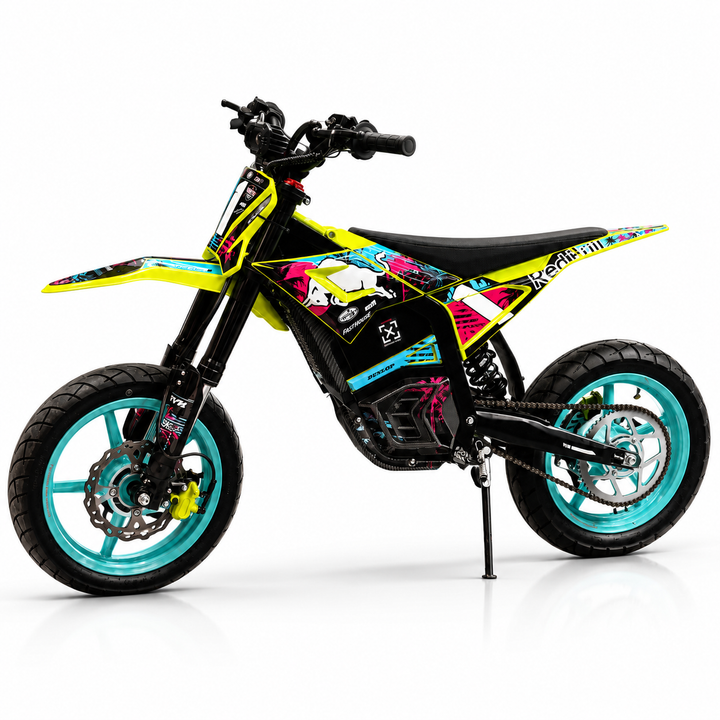 A youth electric dirt bike with a vibrant neon yellow, black, and pink graphic wrap, featuring turquoise blue wheels, shown on a white background with a reflection.