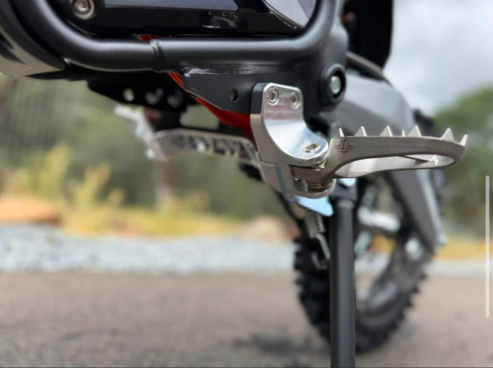 Motorcycle foot peg with blurred background