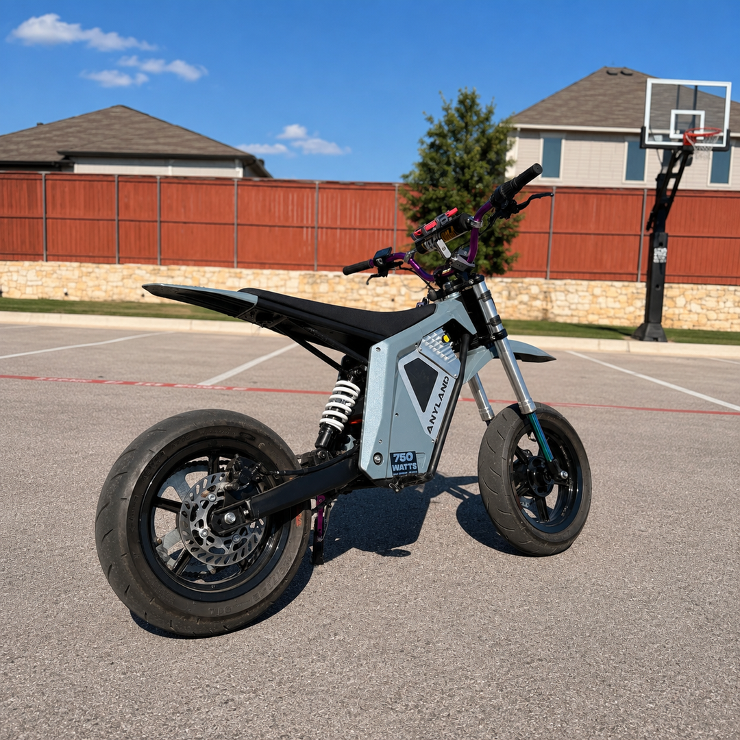 anyland electric pit bike with black supermoto mags wheels - The watts shop