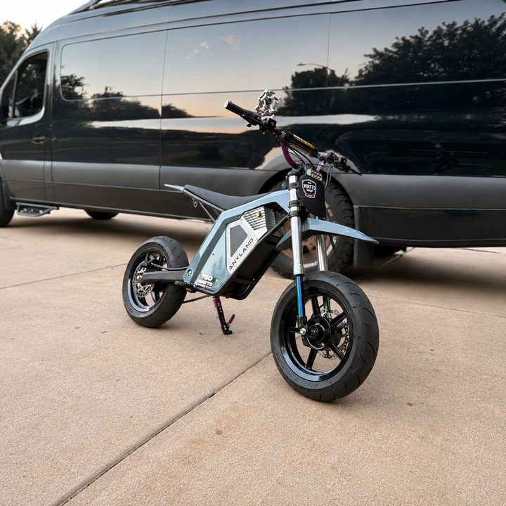 anyland electric pit bike with black supermoto mags wheels - The watts shop