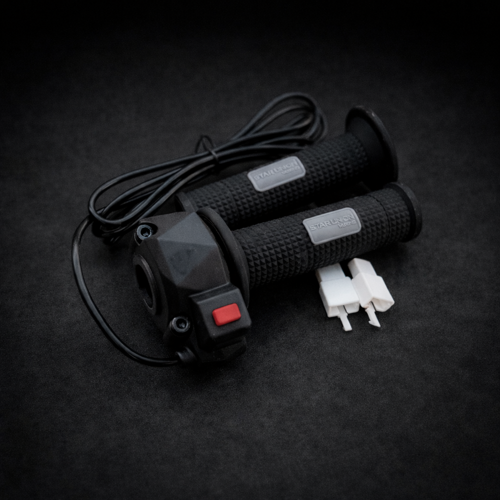 Black electric scooter handlebar controls with wiring on a dark background