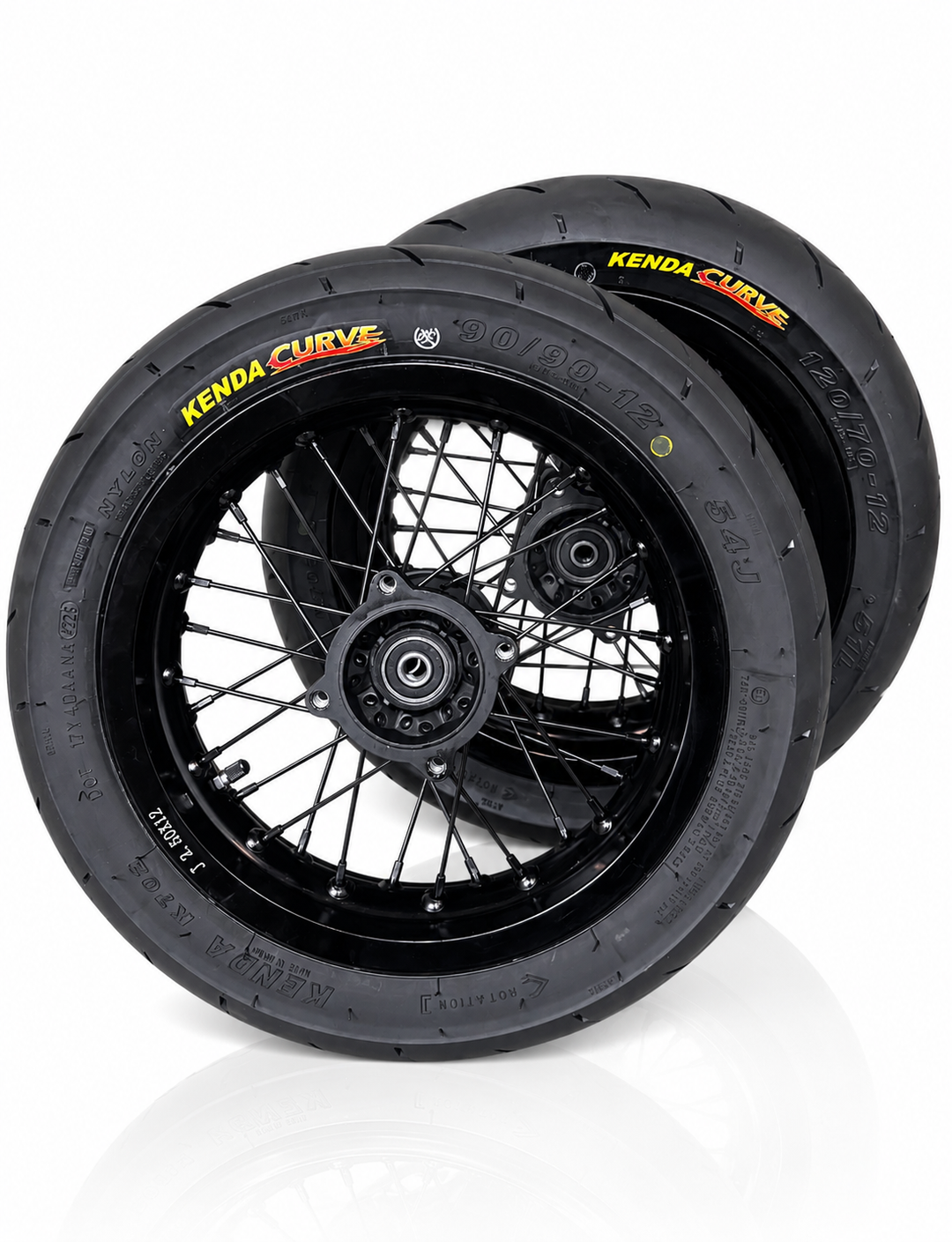 Two motorcycle wheels with Kenda Curve tires on a white background