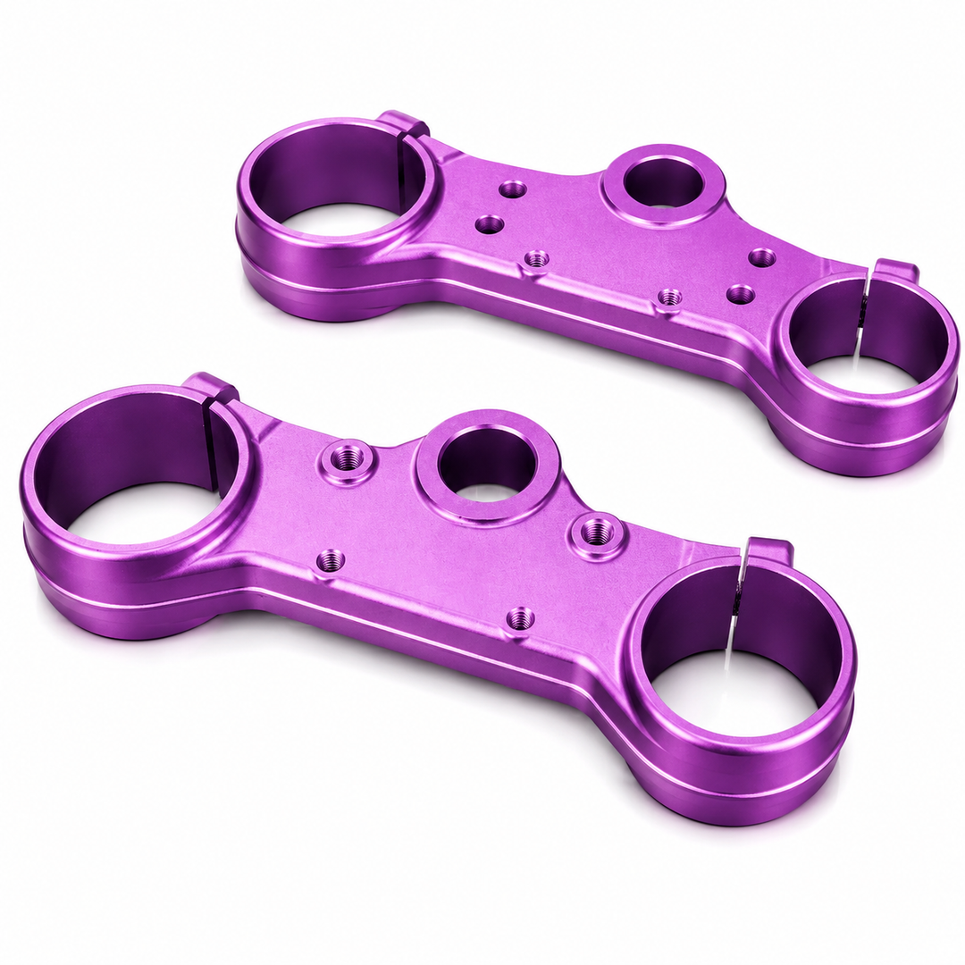 Two purple metal components on a white background